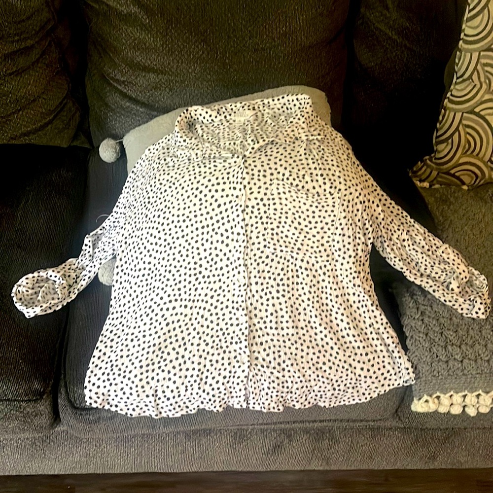 Very comfy top. Good for casual wear or dress it up with slacks and a scarf?